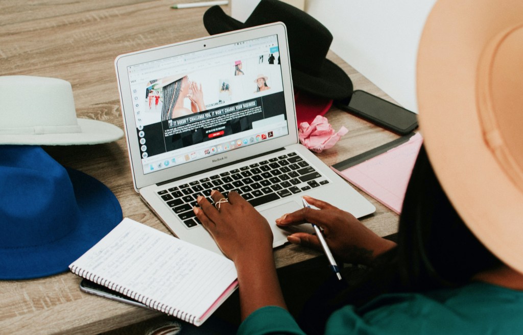 Woman Working at Desk Remotely